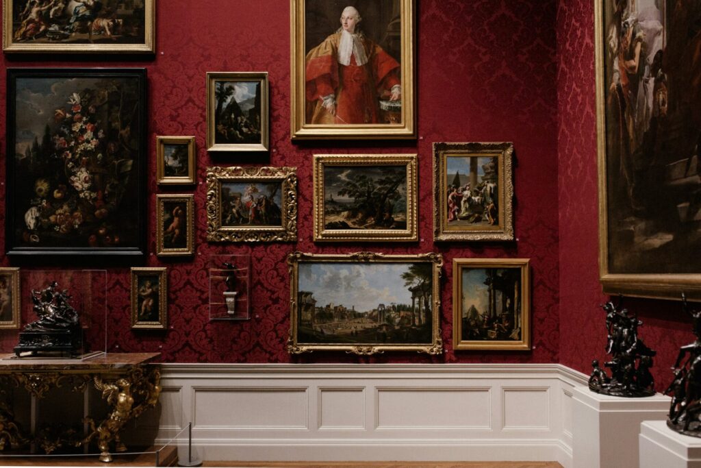 Pictures on a wall in a museum
